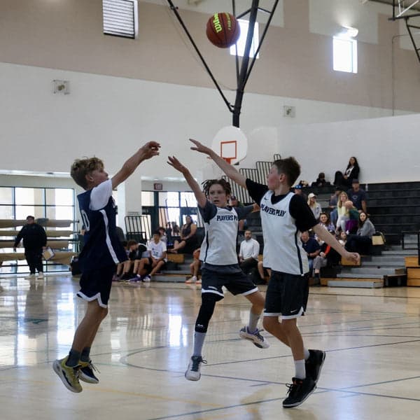 Dime player shooting basketball