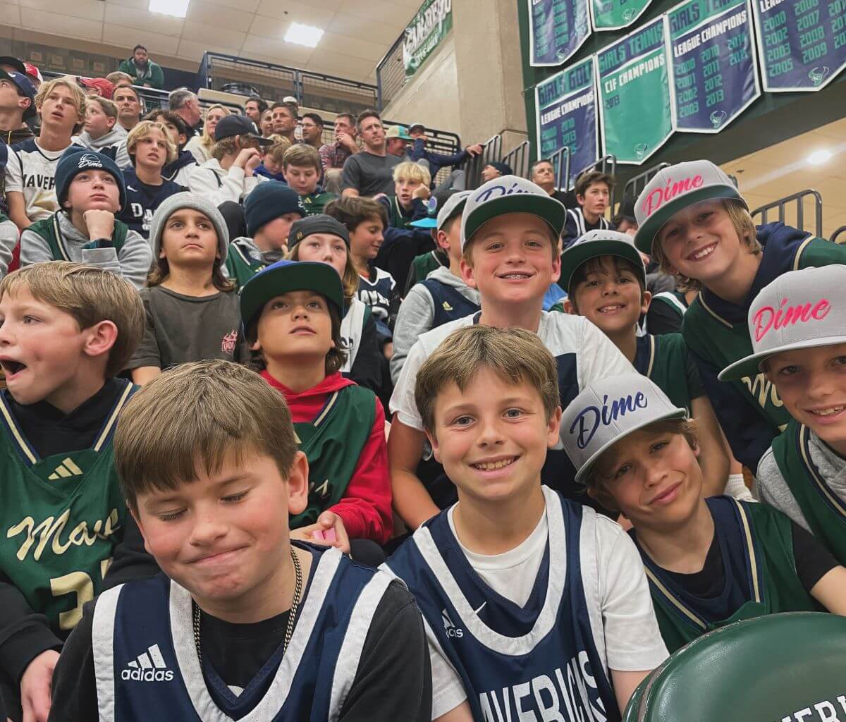 Dime boys basketball players at high school game